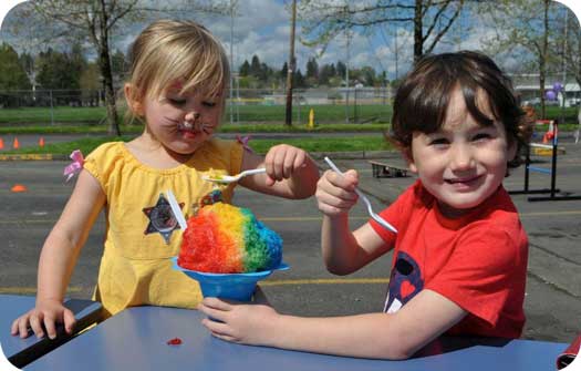 two kids eating slushy on healthy kids day