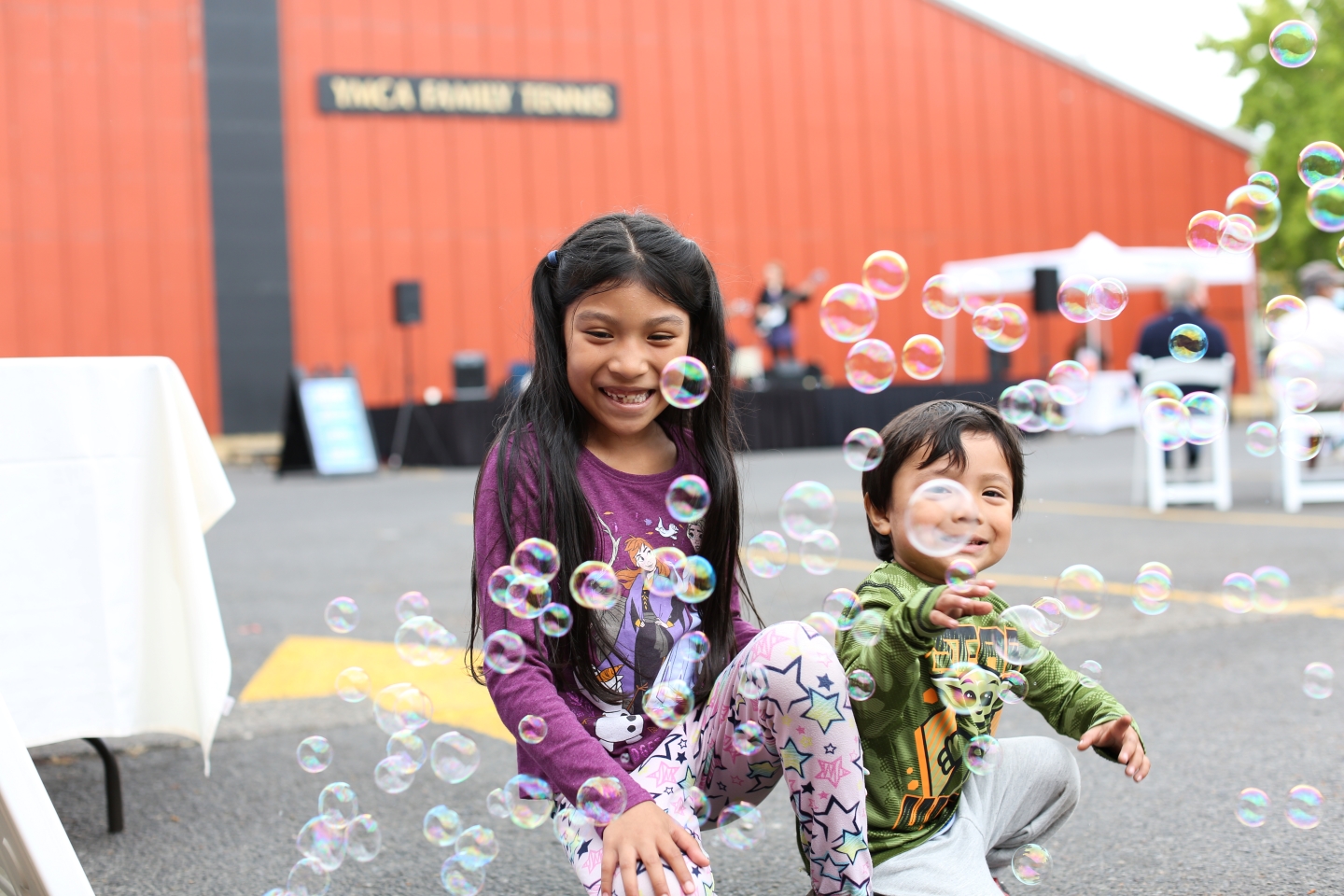 kids playing with bubbles