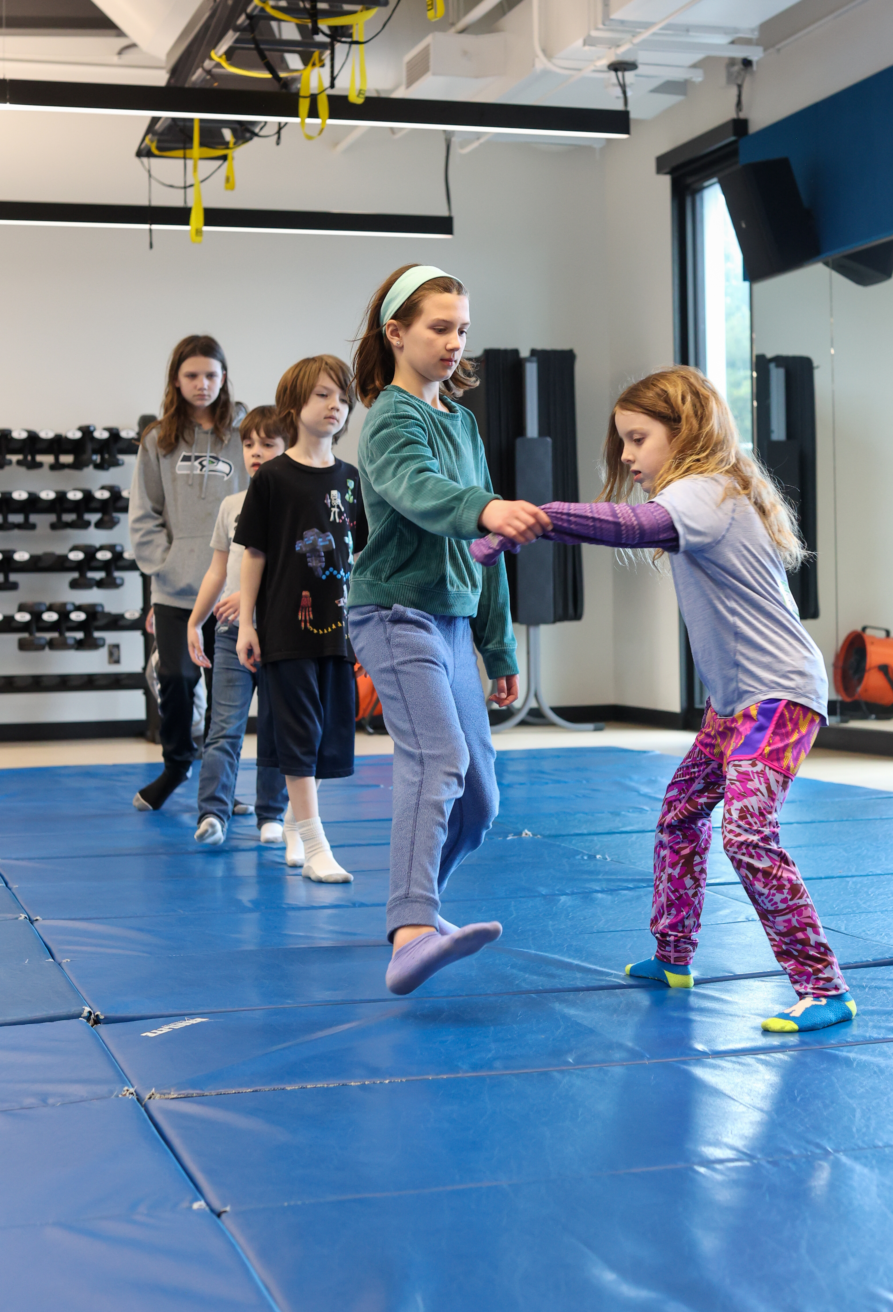 kids taking an aikido class at the ymca