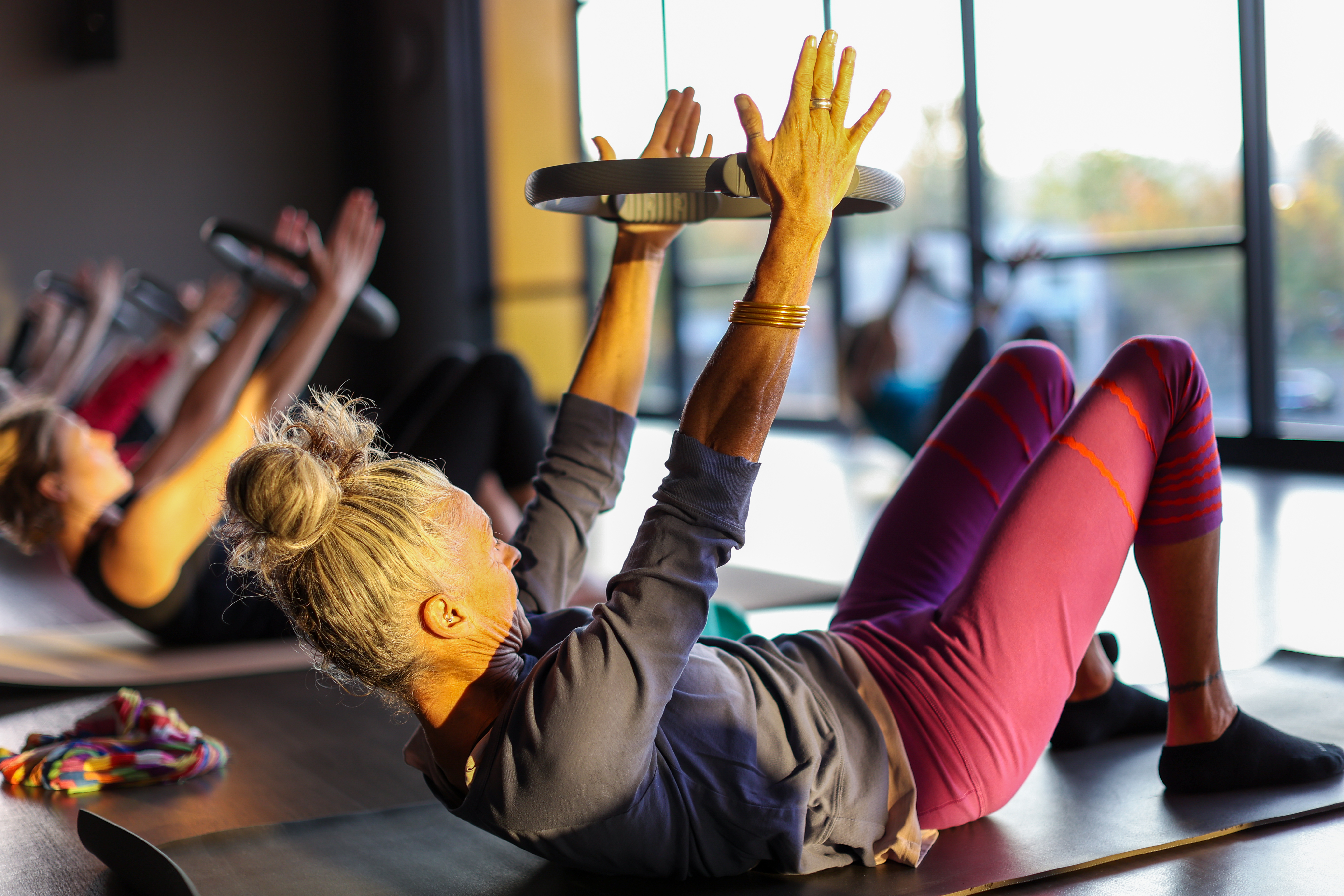 participants enjoying a Pilates class at the YMCA