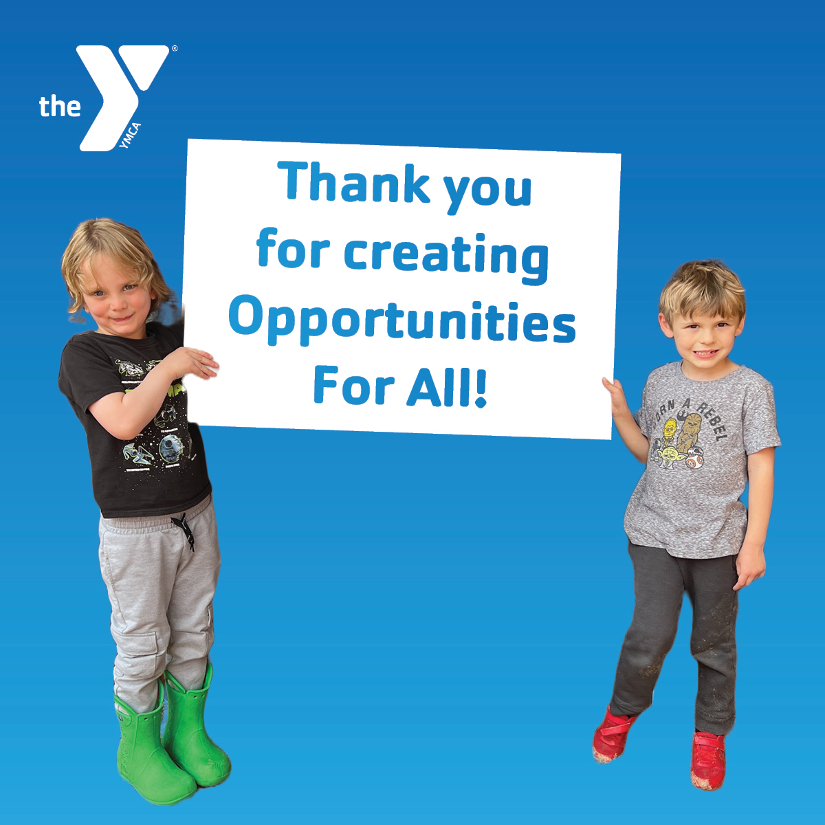 two preschool boys hold a sign thanking members for donating the the ymca opportunities for all fundraising campaign