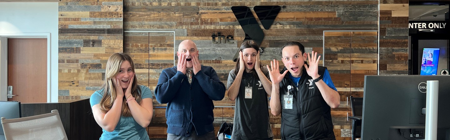 Y staff striking their best surprised poses