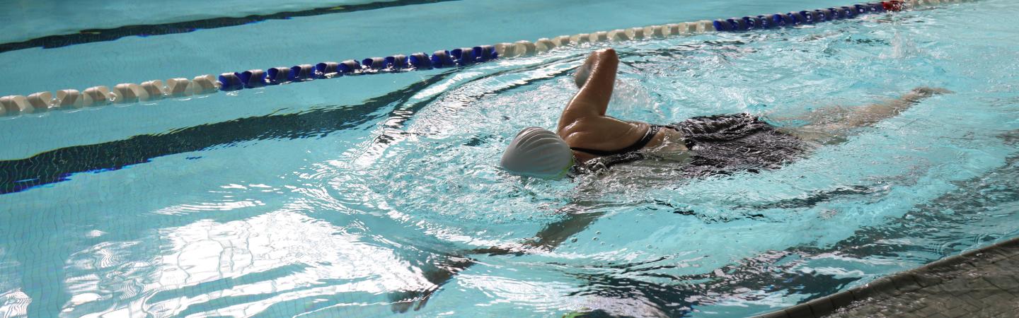 lap swimmer in the eugene ymca aquatics center