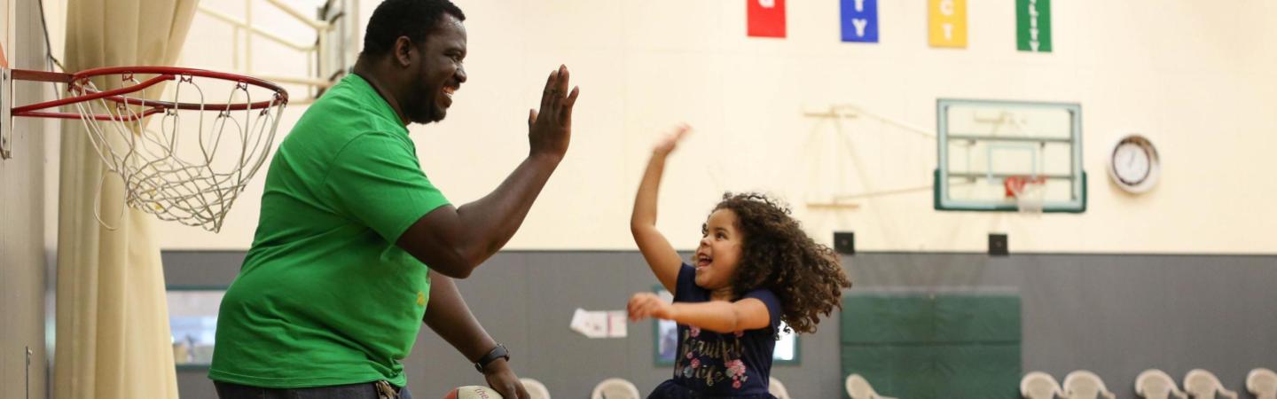 father and daughter basketball at the Eugene YMCA- Diversity & Inclusion