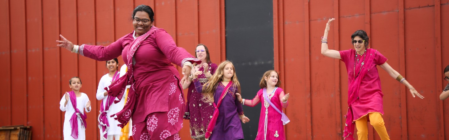 eugene bhangra performers at the welcoming festival