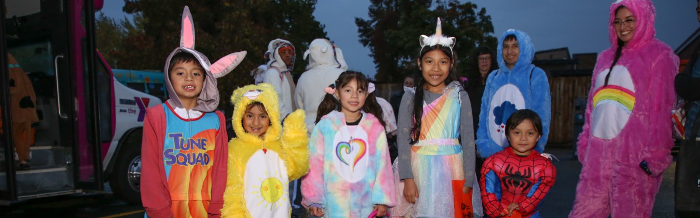 kids in costume at the eugene ymca halloween party