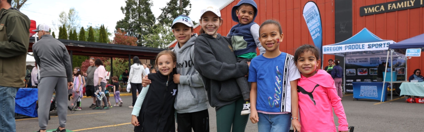 ymca family smiles during healthy kids day event