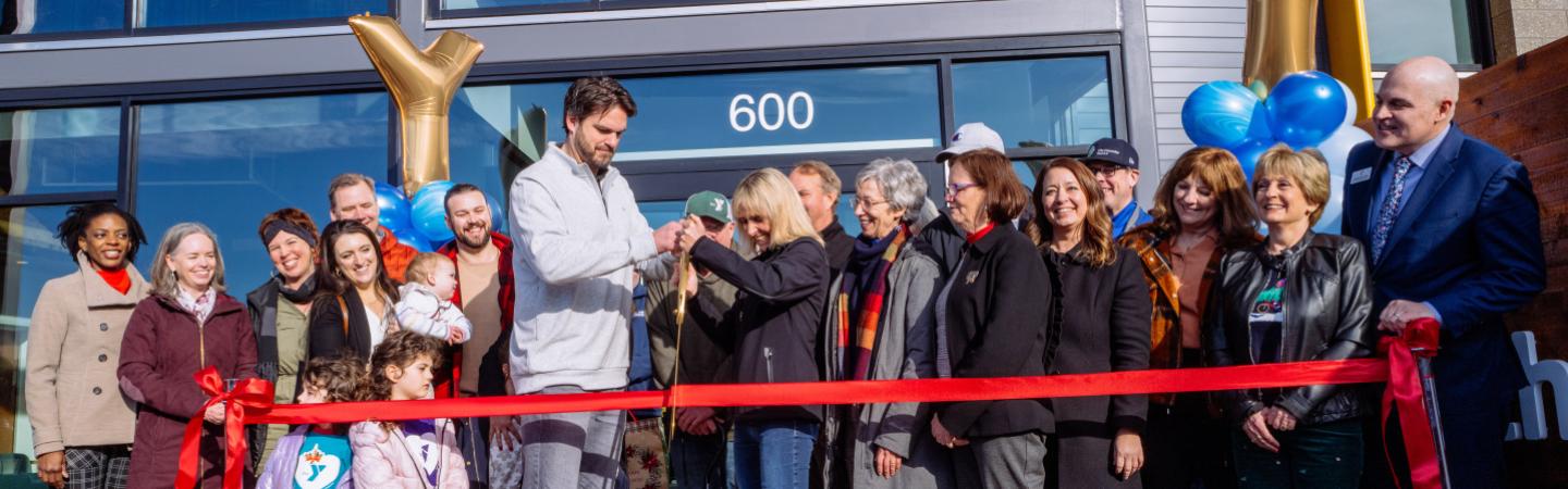 eugene ymca board president joe carmichael and campaign chair sabrina parsons cut the ribbon to the new ymca on saturday