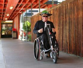 eugene ymca member leaving on tricycle