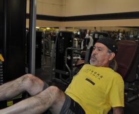 ymca member using the leg press machine