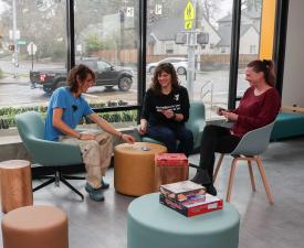 friends talk in the community room