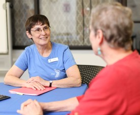 diabetes prevention coordinator talks to class participant