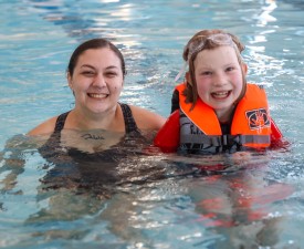 boy and mom use ymca during rec swim