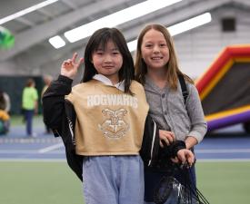 two girls smile at eugene ymca healthy kids day event