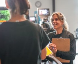 Y staff working with cancer survivor program participant