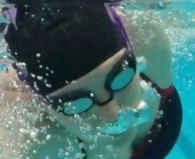 underwater swimmer at eugene ymca aquatics center
