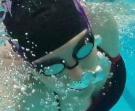 underwater swimmer at eugene ymca aquatics center
