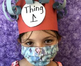 kid wearing mask